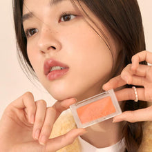 Load image into Gallery viewer, Model wearing Rom&nd Better Than Cheek blush in Mango Chip for fresh tangerine glow