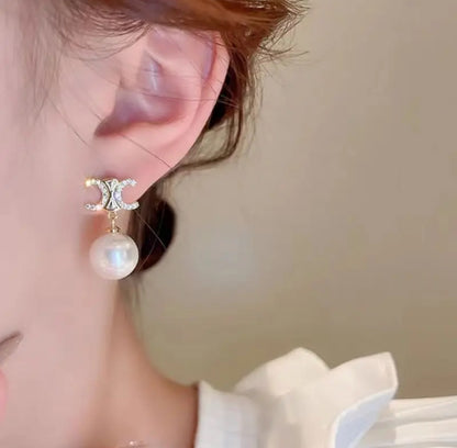 CC diamond stud earrings