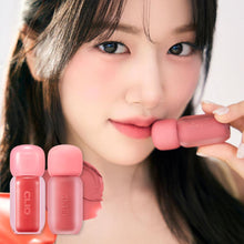 Load image into Gallery viewer, Model wearing CLIO Volumemate Blur Tint – soft, blurred lip finish
